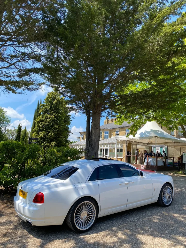 Minibus Hire from Church to Wedding, Stylish minibus with wedding guests onboard, Luxury minibus ready for wedding day transportation, Minibus parked outside a church for wedding hire, Minibus Hire from Hotel to Wedding